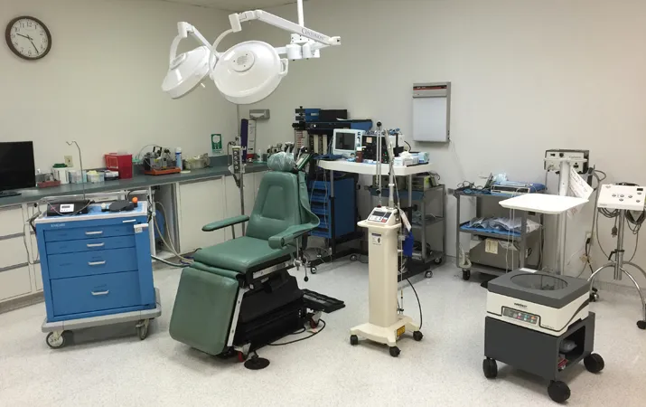 {PRACTICE_NAME} Operatory with examination chair and dental equipment